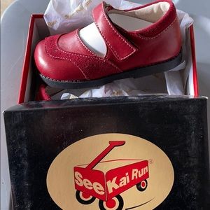Red Mary Jane shoes with velcro buckle